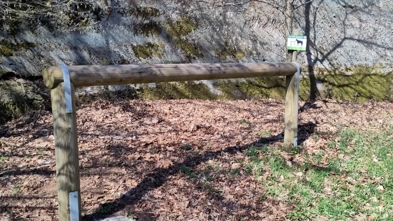 A horizontal bar on two posts to tie up your horses