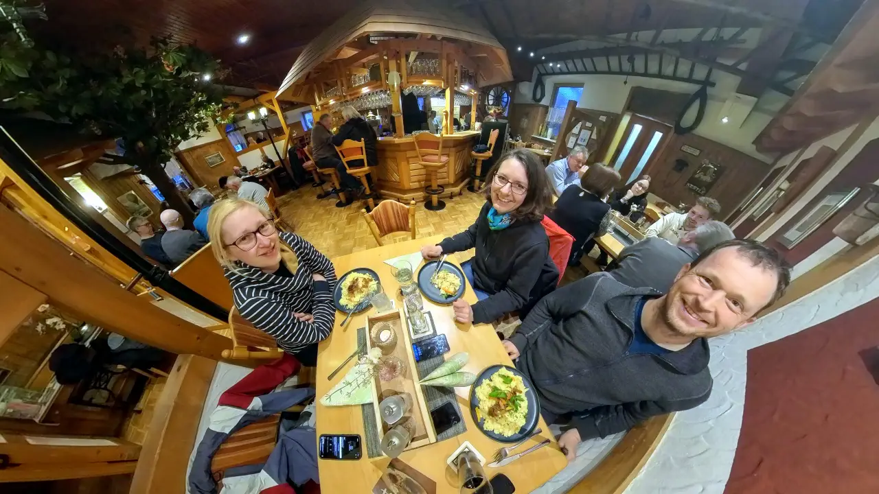 Selfie of the three of us at a restaurant table