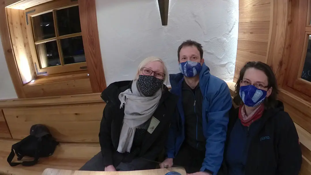 Selfie of Manu, Lütti, and Markus with homemade masks